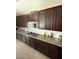 Well-appointed kitchen featuring granite countertops, stainless steel appliances, and ample cabinet space at 2409 W Gilmore Ave, North Las Vegas, NV 89032
