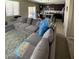 Open-concept living room connects to the kitchen, perfect for entertaining and Gathering interaction at 2409 W Gilmore Ave, North Las Vegas, NV 89032