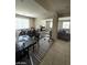 Spacious living room featuring lots of seating and natural light at 2409 W Gilmore Ave, North Las Vegas, NV 89032