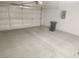 Clean, spacious garage with insulated door and room for parking and storage at 2704 Willow Wren Dr, North Las Vegas, NV 89084