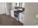 Modern kitchen featuring new stainless steel appliances, sleek cabinets, and stylish backsplash at 2704 Willow Wren Dr, North Las Vegas, NV 89084