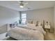 Bedroom with serene decor, comfortable bed, stylish furniture, and ample natural light at 2878 Starling Summit St, Henderson, NV 89044