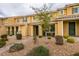 Charming townhome featuring a covered porch, desert landscaping, and easy access to community amenities at 2878 Starling Summit St, Henderson, NV 89044