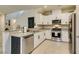 Bright modern kitchen equipped with stainless steel appliances and white cabinetry at 2878 Starling Summit St, Henderson, NV 89044
