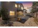 A spacious backyard with a concrete patio and a charming fire pit for cozy outdoor gatherings at 5100 Amethyst Creek Ct, Las Vegas, NV 89131
