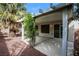 Back patio with a covered pergola and desert landscaping at 5127 Fiji Island Ct, North Las Vegas, NV 89031