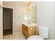 Bathroom features neutral walls, tiled floors, a vanity, and a toilet at 5127 Fiji Island Ct, North Las Vegas, NV 89031