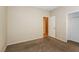 Spare bedroom featuring neutral walls, wall-to-wall carpeting, and a closet at 5127 Fiji Island Ct, North Las Vegas, NV 89031