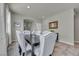 Well-lit dining area showcases stylish seating around a dark table with decorative accents at 5232 Mountain Garland Ln, North Las Vegas, NV 89081