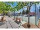 View of basketball court with benches and mature landscaping in a well-maintained community at 5513 Nickel Ridge Way, Las Vegas, NV 89122