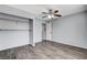 Bedroom featuring wood-look floors, a closet and a ceiling fan at 5513 Nickel Ridge Way, Las Vegas, NV 89122