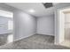 Bedroom with neutral carpet, paint, and trim, with a view into another room at 5513 Nickel Ridge Way, Las Vegas, NV 89122
