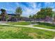 Expansive community common area with playground, basketball court, and picnic spots at 5513 Nickel Ridge Way, Las Vegas, NV 89122