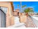 Front exterior featuring a stone turret and decorative entrance to the home at 5527 Breecher Ave, Las Vegas, NV 89131