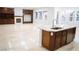 Modern kitchen island with sink and dishwasher, next to spacious living area at 5527 Breecher Ave, Las Vegas, NV 89131