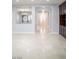 Spacious living room with bright, natural light and elegant marble floors at 5527 Breecher Ave, Las Vegas, NV 89131