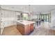 Open concept kitchen featuring a large island, stainless steel appliances, and modern finishes at 5712 Almocita Ct, Las Vegas, NV 89141