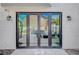 A covered patio area that overlooks an in-ground pool at 5712 Almocita Ct, Las Vegas, NV 89141