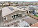 Backyard featuring low maintenance landscaping, pavers, outdoor seating, and a built-in grill at 6261 Lamont Hills Ave, Las Vegas, NV 89139