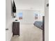 Bright bedroom with carpeting, windows, and neutral decor at 6261 Lamont Hills Ave, Las Vegas, NV 89139