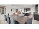 Open-concept dining room adjacent to the kitchen and living areas, great for entertaining guests at 6261 Lamont Hills Ave, Las Vegas, NV 89139