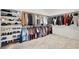 Spacious walk-in closet with built-in shelving and hanging rods for optimal organization at 6261 Lamont Hills Ave, Las Vegas, NV 89139