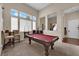 Recreation room with pool table, recessed lighting, and large sunny windows at 6647 Rego Park Ct, Las Vegas, NV 89166
