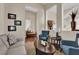 Inviting living room showcasing neutral decor, plush seating, and decorative accents at 6647 Rego Park Ct, Las Vegas, NV 89166