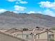 Residential neighborhood with a mountain view at 6647 Rego Park Ct, Las Vegas, NV 89166