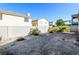 A fenced backyard with desert landscaping and lots of potential at 6856 Council Heights Way, Las Vegas, NV 89142