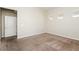 Bright bedroom with neutral walls, carpet flooring, and a walk-in closet at 6856 Council Heights Way, Las Vegas, NV 89142
