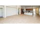 Open living space featuring tile flooring and an easy flow into the modern kitchen at 6856 Council Heights Way, Las Vegas, NV 89142