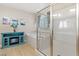 Bright bathroom featuring a tub, shower, and decorative furniture at 8136 Canyon Grassland St, Las Vegas, NV 89166