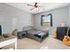Bedroom with bed, guitars, and desk at 8136 Canyon Grassland St, Las Vegas, NV 89166