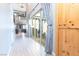 Bright foyer with a soaring ceiling, showcasing tile floors, a staircase, and natural light at 8136 Canyon Grassland St, Las Vegas, NV 89166