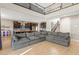 Spacious living area with an oversized couch and an open floor plan at 8136 Canyon Grassland St, Las Vegas, NV 89166