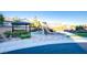 A charming neighborhood playground featuring a covered picnic area and a variety of play structures and equipment at 8136 Canyon Grassland St, Las Vegas, NV 89166
