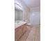 Bathroom features a vanity with a light-colored countertop, a tiled floor, and a shower-tub combination at 9000 Las Vegas Blvd # 1074, Las Vegas, NV 89123