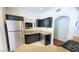 Kitchen showcasing stainless steel appliances, dark wood cabinets, and light countertops at 9000 Las Vegas Blvd # 1074, Las Vegas, NV 89123