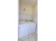 A well-organized laundry area with a washer, dryer, and wire shelving for storage in a dedicated space at 9000 Las Vegas Blvd # 1074, Las Vegas, NV 89123