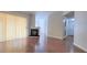 A living room featuring hardwood floors, a fireplace, and a sliding glass door at 9000 Las Vegas Blvd # 1074, Las Vegas, NV 89123