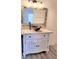 Charming bathroom vanity with unique vessel sink, granite countertop, and decorative mirror at 9000 Las Vegas Blvd # 1133, Las Vegas, NV 89123