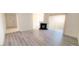 Open-concept living room featuring a fireplace and access to the balcony at 9000 Las Vegas Blvd # 1133, Las Vegas, NV 89123