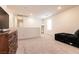Spacious bonus room featuring plush carpeting, bright lighting and a comfortable chaise lounge at 9526 Granville Bridge St, Las Vegas, NV 89139