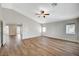 Bedroom with vaulted ceiling, ceiling fan, wood-look floors and great natural light at 9732 Kampsville Ave, Las Vegas, NV 89148