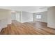 Spacious bonus room with wood-look floors and natural light from a bright window at 9732 Kampsville Ave, Las Vegas, NV 89148