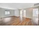 Bonus room with wood floors, neutral paint, and ample space for various activities or relaxation at 9732 Kampsville Ave, Las Vegas, NV 89148