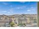 Exterior view showing well-maintained homes and desert views from window at 9732 Kampsville Ave, Las Vegas, NV 89148