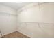 Spacious walk-in closet with carpet and metal shelving for optimal storage at 9908 Camino Loma Verde Ave, Las Vegas, NV 89117
