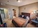 Spacious bedroom with carpet, neutral walls, and access to private bathroom at 10001 Peace Way # 2269, Las Vegas, NV 89147
